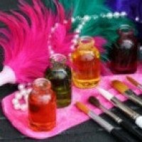artist brushes and massage oil